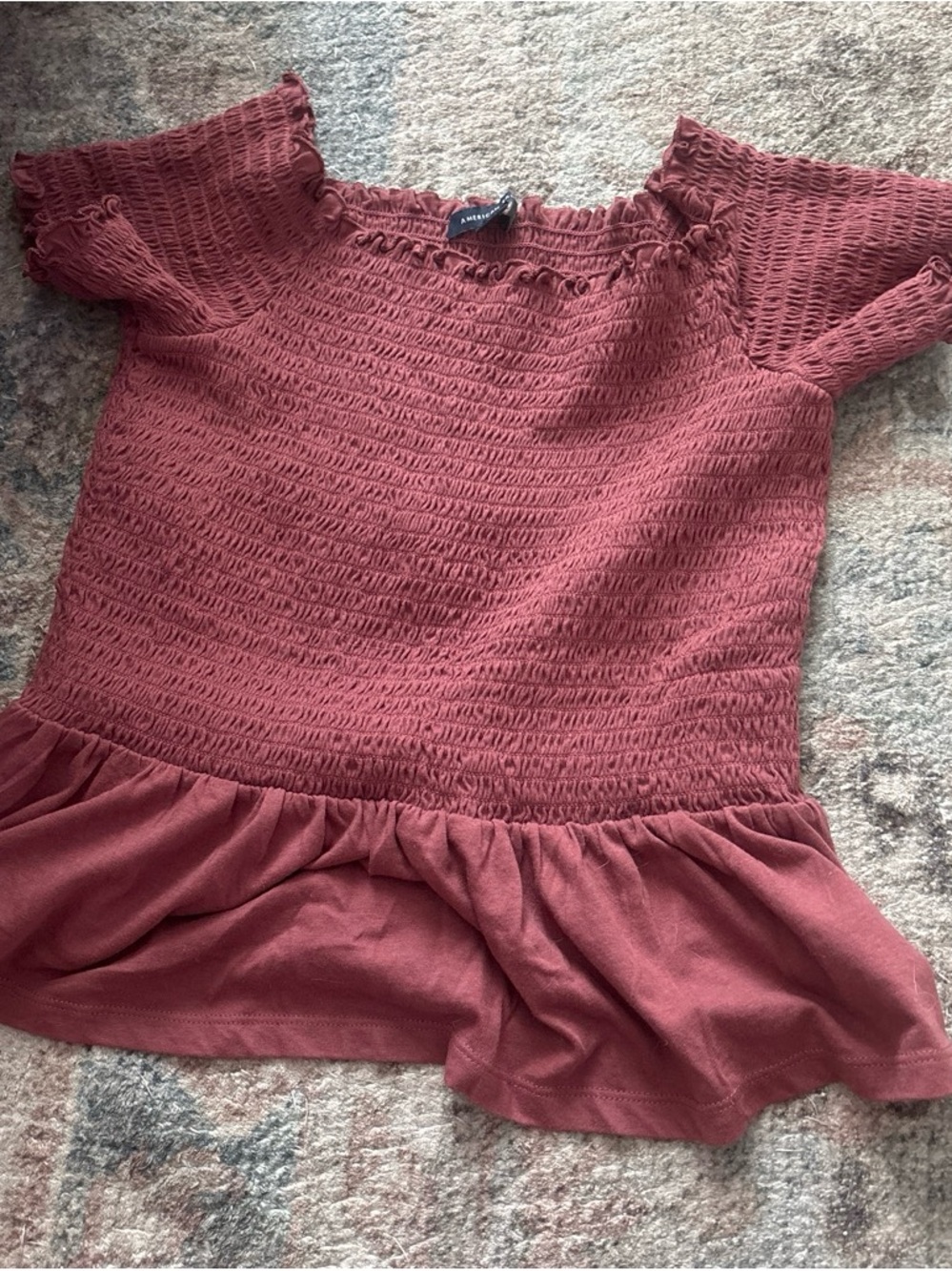 Rust Smocked Peplum Top